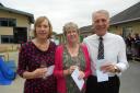 DEBT OF GRATITUDE: The Cotswold School teachers Jan Paish, Helen Kempson and Derek Thomas have been honoured with special awards for their long service and dedication