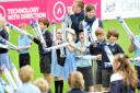 Action from the one day international cricket match between England Womens Cricket team and Pakistan Womens Cricket team at Worcestershire County Cricket Ground, New Road, Worcester......Wyche CE Primary School pupils welcome the players on to the pitch..