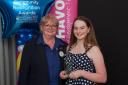 AWARD: Lindsay Roach, Tesco community champion giving an award to Kiaragh Brown.