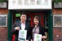 FUNDRAISING EFFORTS: WaiLo Li with James Wong, managing director of Chung Ying Restaurant Group.