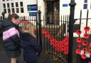 Children paid respects by observing a minute's silence on Remembrance Day