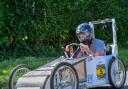 Tom Gwynn in his soapbox racer, the Glo Cart