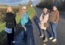 Harriett Baldwin (left) met with local councillors last year to discuss safety on the A46. Now she is demanding accelerated action to tackle the problem