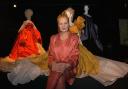 Vivienne Westwood posing with some of her designs in 2004