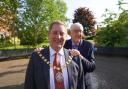 Councillor Alex Sinton hands over the Chairman’s chain to councillor Robert Raphael