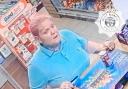 POLICE: Officers want to speak to this woman after a purse was stolen from a car