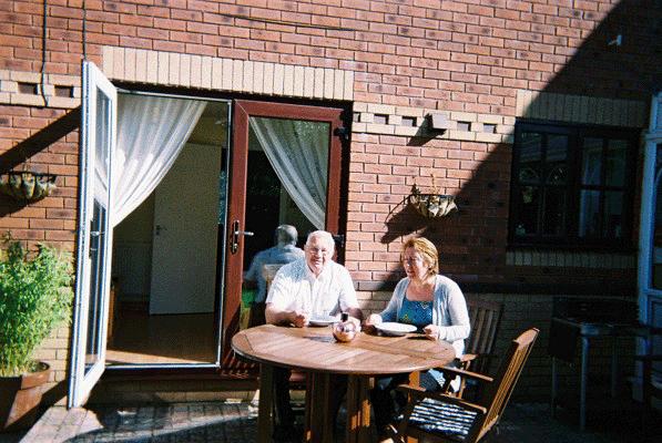 Robert and Nanny Poppy having their breakfast in the sunshine