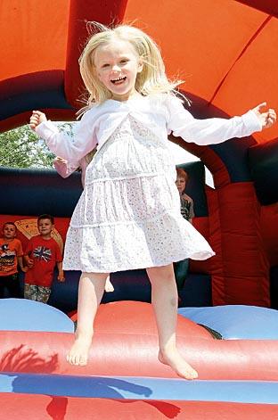 Sadie Ellis, 5, enjoys the bouncy castle