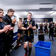 GJ van Velze of Worcester Warriors is presented with a bottle of champagne after making his 100th appearance for the club.