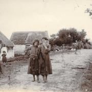 A farmworker and his barefoot daughters in a Worcestershire village in the late 1800s. Similar photos in the set suggest it might have been taken near Malvern.