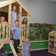 A forest-themed library has opened at The Littletons CE First School