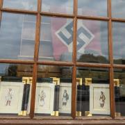 A Nazi flag in the window of Saturday Auction in Blackminster