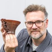 Charles Hanson finds rare cup in Chipping Camden garage.