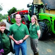 DEMONSTRATION: Overbury Farms launched as a LEAF farm. From left: Caroline Drummond, chief executive of LEAF, Jake Freestone, farm manager, and Penelope Bossom, farm owner. 41150901.