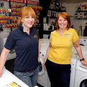 BATTLING: Abbey Appliances office manager Hanna Knight, left, and shop manager Wendy Jordan. 2813355201