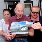 Evesham Loyalty Card scheme's September draw. Pictured from left are Jane Hopwood, owner Avalon Holistic Health; Dave Purser, Master Butcher, and Lee Fisher, August's winner