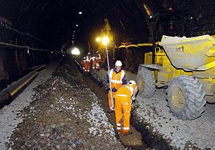North Cotswold Line Redoubling.  Working on the drainage systems inside the tunnel.