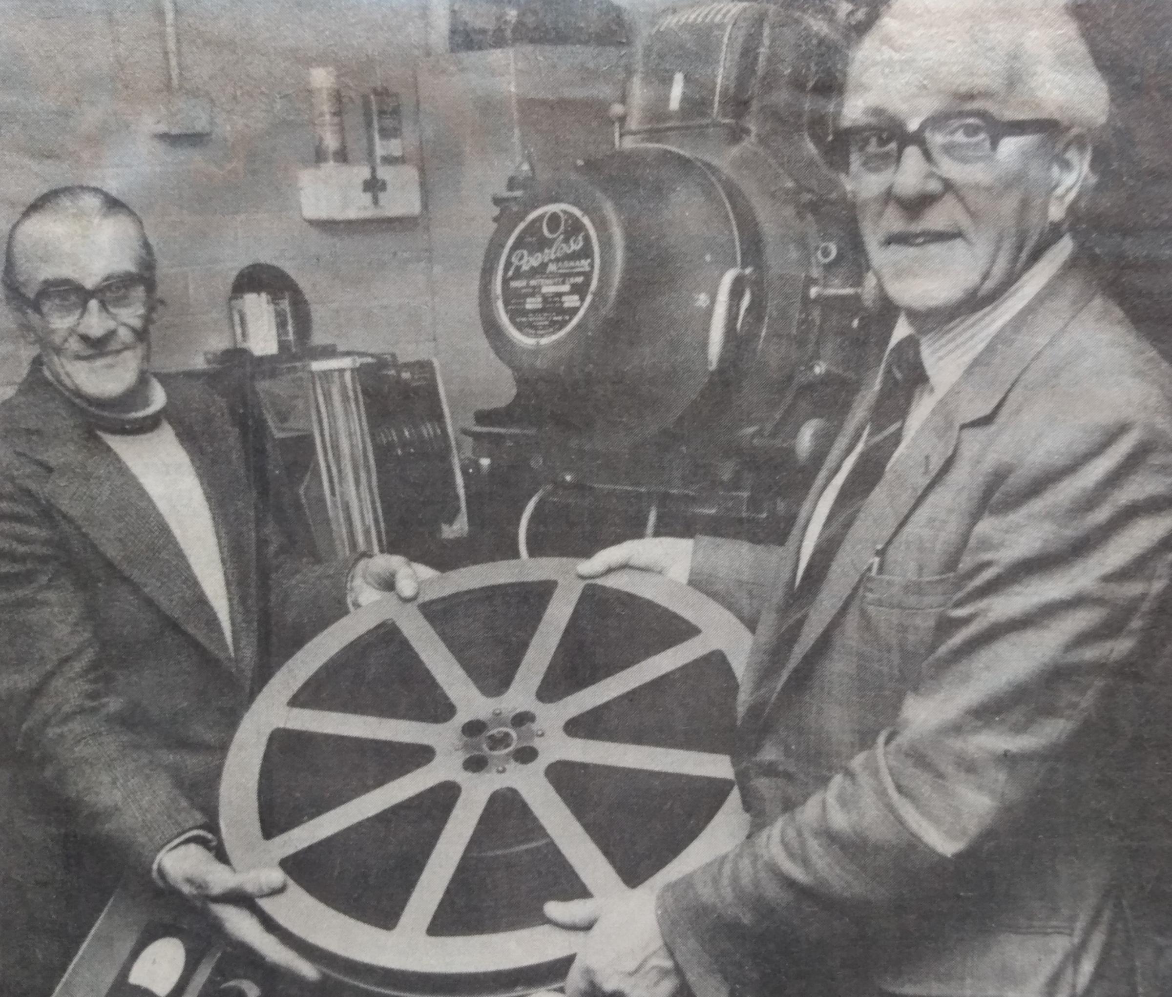 January 1983, and Regal cinema manager Ernie Highland, right, is pictured with projectionist Peter Bennett after it was announced that ET had broken box office records the previous year