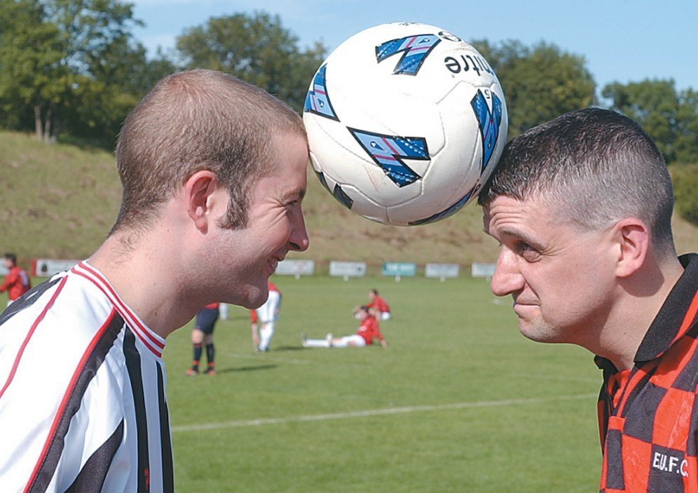 August 2003 and Mark Payne (Tescos team captain) and Clive Cook (Safeway captain) go head-to-head at the charity football match between the supermarkets’ staff for the annual Retail Challenge Cup