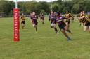 Romeo Johnson about to score the second try for Evesham colts. Picture: Andrew Moore