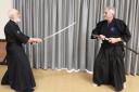 Barry Jones (L) and Luigi Pasqualin (R) achieved a black belt in Japanese sword art