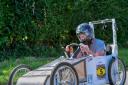 Tom Gwynn in his soapbox racer, the Glo Cart
