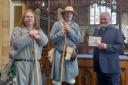 Matt Cloverleaf and Clive Emerson completed a medieval pilgrimage to raise money to save the Almonry over the Easter weekend. Here they deliver a handwritten message to Reverend Andrew Spurr