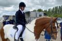 Bethan Edwards on top of her horse Sunny at the Riding for the Disabled  competition in Wiltshire