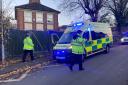 HURT: An ambulance on Stanley Road after the boy, six, was knocked down