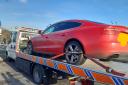 Seized: Police seize Audi on the M5 after being pulled over for dangerous driving.