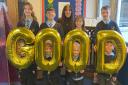 GOOD TIMES: Staff and students at St Barnabas CofE First and Middle School, in Pershore. celebrate their Good Ofsted.