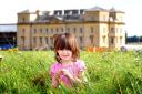 WHILE THE SUN SHINES: Ruby Burns makes the most of the sunshine at Croome Court, near Worcester.