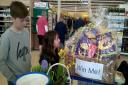 PRIZE: Visitors tried their luck at guessing how many eggs were in an Easter hamper at Evesham Tesco. Picture supplied by Lindsay Roach.