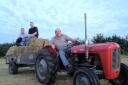 TRACTOR: Darren Eden’s father Dave, front, with Dan Smart, middle, and Darren Emery.
