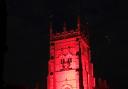 The Bell Tower in Evesham was turned red for Anti-Slavery Day 2021. Photo: Rotary Club of Evesham