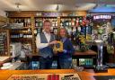 Alex McKay and Sophie Mendez with the heart defibrillator at the New Inn