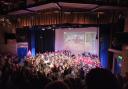 About 120 young performers played the specially composed piece