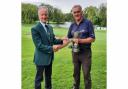 Winner: Vale Golf and County Club Seniors Captain Brian Bunn congratulates double winner Mike Roberts (right).