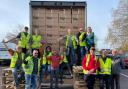 Teams4u Evesham, with help from LK Aerial, loaded the 8,633 shoeboxes onto the waiting lorry driven by Nicu (centre)