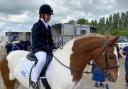 Bethan Edwards on top of her horse Sunny at the Riding for the Disabled  competition in Wiltshire