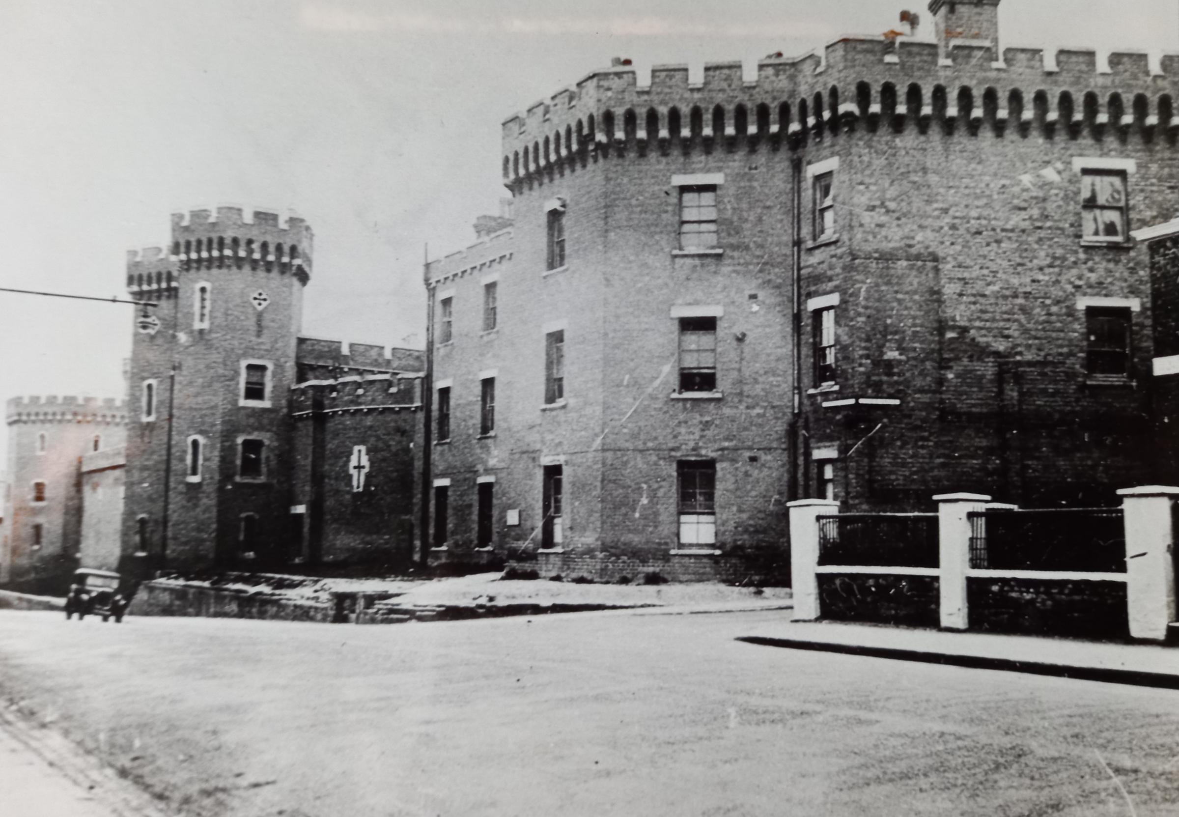 Worcester’s old County Jail in Castle Street. The frontage was knocked down and HA Saunders garage built, while behind in some of the old prison buildings furniture firm GT Rackstraws operated