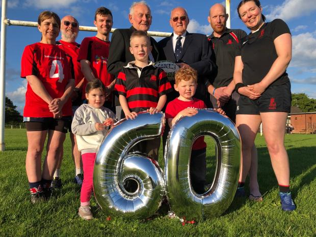 Evesham Journal: Pictured back row: Touch players Emma Field, John Staveley and Matthew Perry, first chair Roy Hirons, current chair Bill Hurley, and Toby Grace and Nadia White of the 15-a-side teams. Front row: Lainey Nottingham, Riley Nottingham and Tommy Hughes from the Pershore Pups.