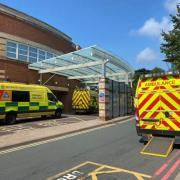 Ambulances queue outside Worcestershire Royal Hospital.