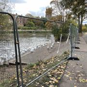 Fencing has been put in place along the riverside path.