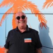 Tour guide and host Brendan Sheerin welcomes Ginny Lemon aboard Celebrity Coach Trip (Pic: Channel 4)