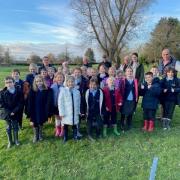 Fladbury First School pupils planted 30 trees at Evesham Golf Club as part of the Woodland Trust's initiative