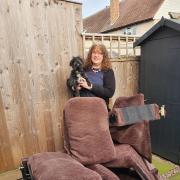 Cllr Emma Stokes, Executive Board Member for Resident and Customer Services on Wychavon District Council, with Bruce the dog and their unwanted sofa