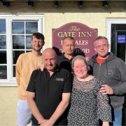 The pub staff and punters at The Gate Inn who helped to save a woman's life. Back row L-R: Mitch Ashmead, Matt Henson and Gary Benfield. Front row: Ian and Julie Leyton.