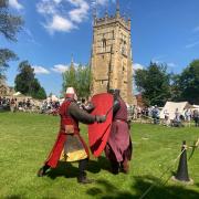 Reenactors battle it out in the arena at Evesham Medieval Market on Saturday (May 20)
