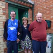Freedom Day Centre founder Tracey Hemming (centre) with son Eddie (left) and brother Tony (right).